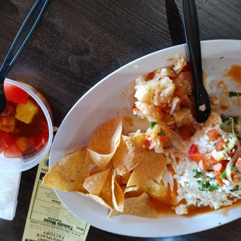 The Tamale Store - Chile Relleno omelet, with breakfast papas, and a fruit medley, along with some corn tortilla chips. - Mexican Near Me - Phoenix, Arizona