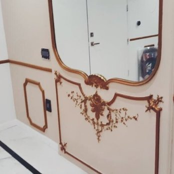 Rodriguez Construction - a bathroom with a large mirror - Demolition Services Near Me Rodriguez Construction - a bathroom with a large mirror - Demolition Services Near Me