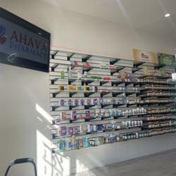 AHAVA Pharmacy - Inside there are a couple chairs.