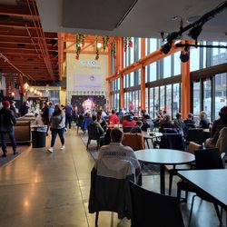 ArtsQuest Center - Big screen and tables for the game!