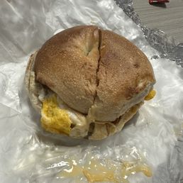 sausage bacon egg and cheese on plain bagel