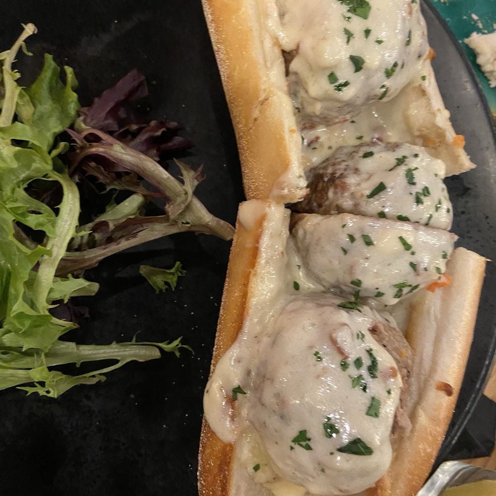 Husband got the meatballs but wasn't expecting a cream sauce- arabiata is what he ordered but he liked it fine.