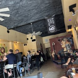 Speakeasy Kava - Inside seething along Bar top