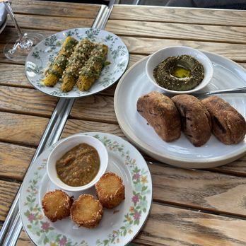 Folke Restaurant - From top...Mini Corn cobs, Rye Bread with eggplant za'atar and tater tots - Vegan Near Me - Vancouver, British Columbia
