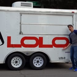 Lolo - Derrick V. in front of Lolo