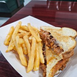 The Rustic Wagon Cafe - Bbq pulled pork grilled cheese sandwich with French fries
