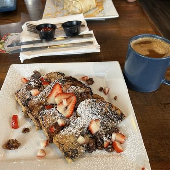 Cafe Organix - French toast, topped with strawberry slices, walnuts and powdered sugar. - Breakfast & Brunch Near Me - San Bernardino, California Cafe Organix - French toast, topped with strawberry slices, walnuts and powdered sugar. - Breakfast & Brunch Near Me - San Bernardino, California