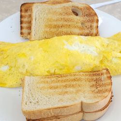 Tobey's Donut Shop - Meat and cheese omelet with sausage and Swiss cheese and sour dough bread