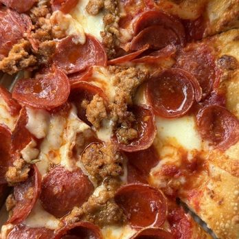 Annesso Pizzeria - Red Pepperoni Pizza with added sausage - Italian Near Me - Fresno, California Annesso Pizzeria - Red Pepperoni Pizza with added sausage - Italian Near Me - Fresno, California