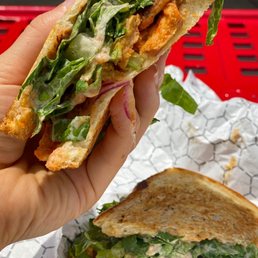 Buffalo Chicken Ranch--Soy Curls, Buffalo Sauce, Cashew Ranch, Celery, Red Onion, Lettuce, 16 Bricks Sourdough Buffalo Chicken Ranch--Soy Curls, Buffalo Sauce, Cashew Ranch, Celery, Red Onion, Lettuce, 16 Bricks Sourdough