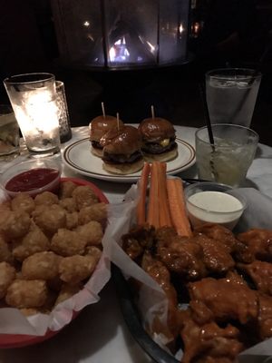 Photo of The Griffin - Los Angeles, CA, US. Tater tots, chicken wings and sliders (burger)