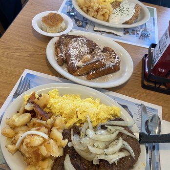 The Smokey Griddle Pancake House - (Bottom) steak and eggs with home fries and French toast  (Top) country fried steak with home fries and biscuit - New American Near Me - Williamsburg, Virginia