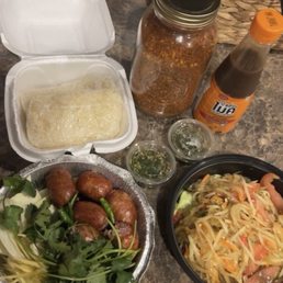 Takeout ; Thai sausage , tum muk hoong and sticky rice