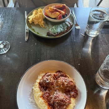 Osteria Olio - Polenta with meatballs, steak and eggs with fruit. - Wine Bars Near Me - Athens, Georgia Osteria Olio - Polenta with meatballs, steak and eggs with fruit. - Wine Bars Near Me - Athens, Georgia