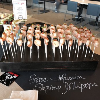 Foodz Catering - "Sonic Infusion" Shrimp lollipops. Last minute add with a perfectly seasoned cocktails sauce topper - Caterers Near Me - Seattle, Washington Foodz Catering - "Sonic Infusion" Shrimp lollipops. Last minute add with a perfectly seasoned cocktails sauce topper - Caterers Near Me - Seattle, Washington