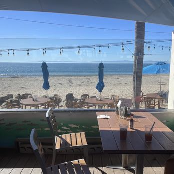 Shoreline Cafe - Table on the patio, overlooking the beach - Seafood Near Me - Santa Barbara, California
