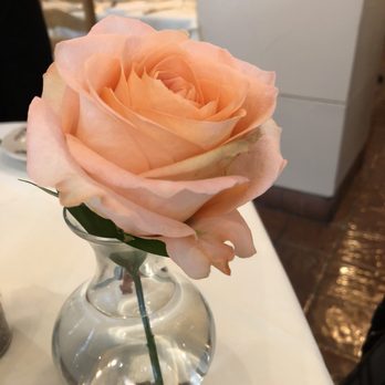 Il Terrazzo Carmine - fresh flowers and white table cloth - Italian Near Me - Seattle, Washington
