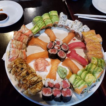 Sushi Iwa - From left around the plate. American Dreams, Forever Young, Philadelphia, Special Salmon, Forever Young,. So good. - Asian Fusion Near Me - Apex, North Carolina Sushi Iwa - From left around the plate. American Dreams, Forever Young, Philadelphia, Special Salmon, Forever Young,. So good. - Asian Fusion Near Me - Apex, North Carolina