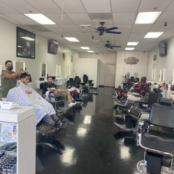 True Blends Barbershop - Eugene, the owner busy with a client while another barber sits idle for over twenty minutes for "an appointment". Others are intimidators - Barbers Near Me - Peoria, Arizona
