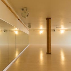 Elements Hot Yoga - Mirrors allow you to steadily improve your alignment and form.