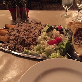 The Desert Inn - Potato wedges, rice, salad and garlic bread - Middle Eastern Near Me - Canton, Ohio The Desert Inn - Potato wedges, rice, salad and garlic bread - Middle Eastern Near Me - Canton, Ohio