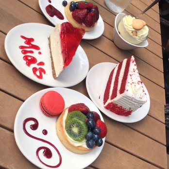 Mia's Bakery - Cheese Cake slice, Fruit Tart, Red Velvet slice, Banana Pudding and a Strawberry Smoothie Macaroon - Bakeries Near Me - Brooklyn, New York