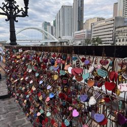 Jones Bridge - Personalized locks at pasig river by jones bridge with binondo-intramuros bridge in background