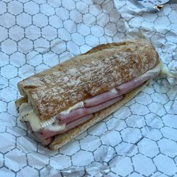 Brioche by Guy Savoy - Ham and Brie baguette, with tax was $20.50. Contained no condiments.
