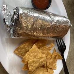 Three Amigos Mexican Taqueria - The overstuffed beef burrito with chips on the side