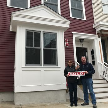 Jason Ladeira - Compass - Kris & Dolly celebrating their new condo in South Boston! - Real Estate Agents Near Me - Hingham, Massachusetts
