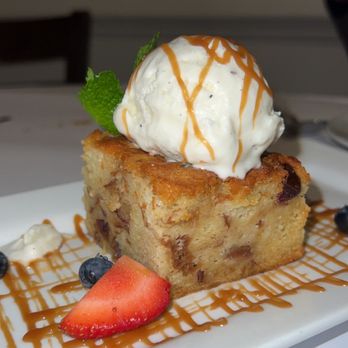 Chefs Table - Bread pudding , topped with vanilla gelato & caramel drizzle - Italian Near Me - Lynbrook, New York Chefs Table - Bread pudding , topped with vanilla gelato & caramel drizzle - Italian Near Me - Lynbrook, New York