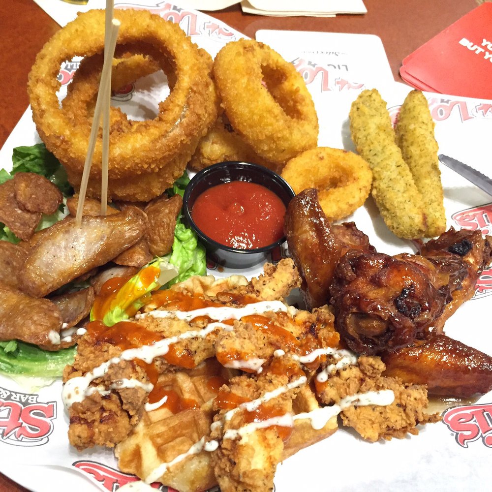 St. Louis Bar & Grill - St. Louis Sampler - Chicken Wings Near Me - Toronto, Ontario St. Louis Bar & Grill - St. Louis Sampler - Chicken Wings Near Me - Toronto, Ontario