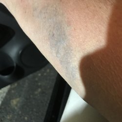 Two-O-Eight Fuel Plaza - Stopped at 11:45pm on June 7. Walked in a couple steps & fell on my back and scraped my arm on something. Entire floor was soaked w/water