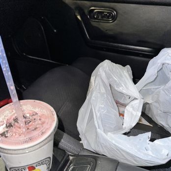 Dave's Hot Chicken - Large strawberry milkshake with a Dave's #3 in a bag in the passenger seat of my vehicle because it was at the moment unoccupied. - Chicken Shop Near Me - Seattle, Washington