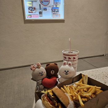 In-N-Out Burger - Outdoor dining... and information on the wall - Fast Food Near Me - Ontario, California In-N-Out Burger - Outdoor dining... and information on the wall - Fast Food Near Me - Ontario, California