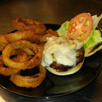 Valley Tavern Grille - Mushroom Swiss Burger; a 1/2 lb., burger patty cooked to order with sauteed mushrooms and melted swiss cheese and french-fries or onion ring - American Near Me - Valley View, Ohio