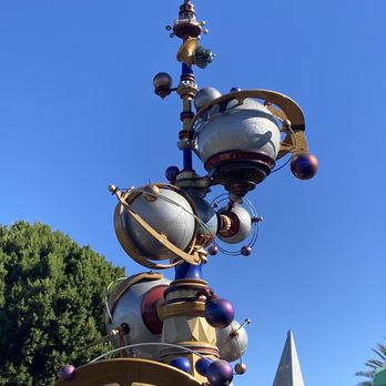 Tomorrowland - Astro orbiters - Amusement Parks Near Me Tomorrowland - Astro orbiters - Amusement Parks Near Me