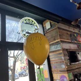 a yellow balloon with the word crazy written on it a yellow balloon with the word crazy written on it
