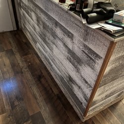 Cowboy’s Custom General Contractor - Install custom planks on kitchen island