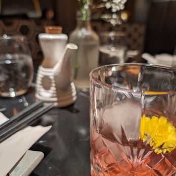 Flame sushi - A night in Sapporo was a delicious drink, made with a smoky mezcal mixed with a sweet juice - Sushi Bars Near Me - Toronto, Ontario
