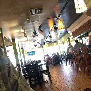 Cha Cha Coconuts - View onto St. Armands. Circle. - Bars Near Me - Sarasota, Florida