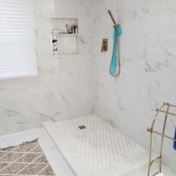 Albert Construction Renovations - a bathroom with a marble shower - Cabinetry Near Me Albert Construction Renovations - a bathroom with a marble shower - Cabinetry Near Me