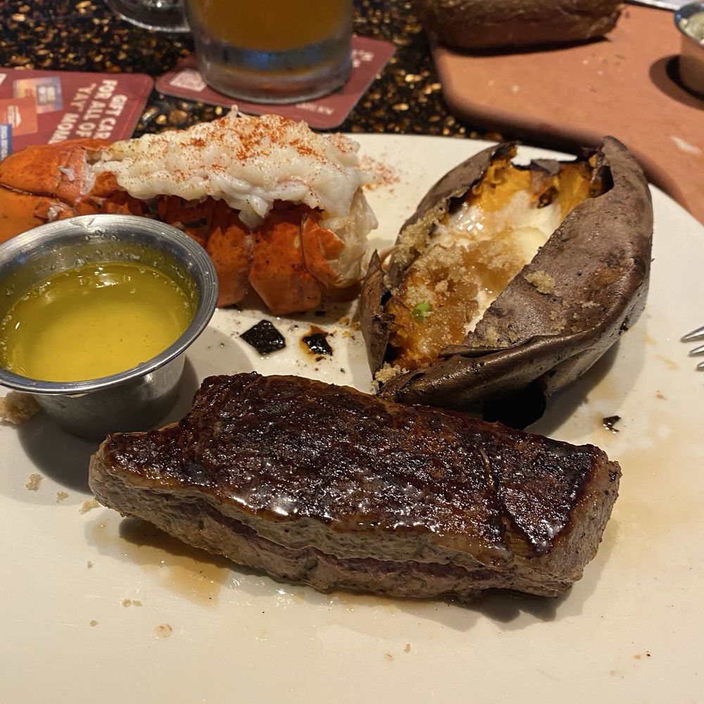 Outback Steakhouse - Tuesday's Tail - Surf & Turf w/ loaded sweet potato - Steakhouses Near Me - Rocky Mount, North Carolina