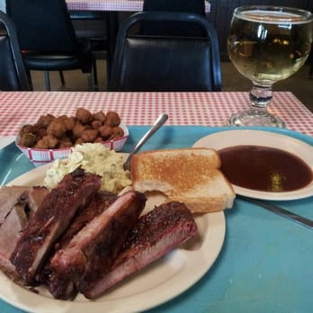 David's Barbecue - Sliced beef brisket and pork ribs with fried okra and potato salad. - Barbeque Near Me - Pantego, Texas David's Barbecue - Sliced beef brisket and pork ribs with fried okra and potato salad. - Barbeque Near Me - Pantego, Texas