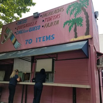 La Palapa - Pink taco hut outside. Popular lunch spot - Mexican Near Me - Houston, Texas