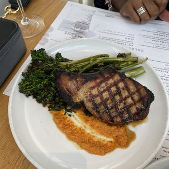 Sixty Vines - Pork chop and broccoli - Wine Bars Near Me - Houston, Texas Sixty Vines - Pork chop and broccoli - Wine Bars Near Me - Houston, Texas