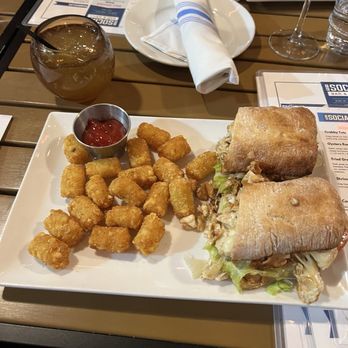 The Social - Chicken Cheesesteak with tater tots. - New American Near Me - Severna Park, Maryland The Social - Chicken Cheesesteak with tater tots. - New American Near Me - Severna Park, Maryland