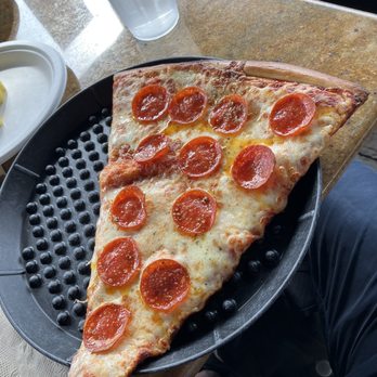 Gina's Pizza - Gigantic slice - Pizza Near Me - Corona Del Mar, California Gina's Pizza - Gigantic slice - Pizza Near Me - Corona Del Mar, California