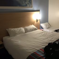 Family Bedroom; one large bed, and a small bed on either side.  Very nice, clean, sufficient.