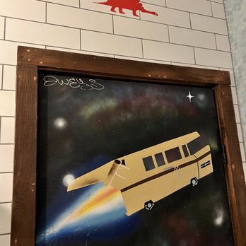 Moo & Brew - a picture of a school bus flying through space - Beer Bar Near Me - Charlotte, North Carolina Moo & Brew - a picture of a school bus flying through space - Beer Bar Near Me - Charlotte, North Carolina